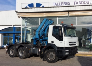 Tractora de ocasión IVECO AD380T41 6x4 con grúa.