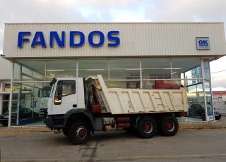 Dumper de ocasion IVECO MP380E42W 6x6 con tracción total.