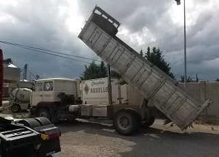 Truck Renault DG-260.20, year 1990 with tipper box.