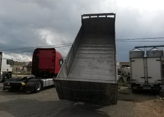 Truck Renault DG-260.20, year 1990 with tipper box.